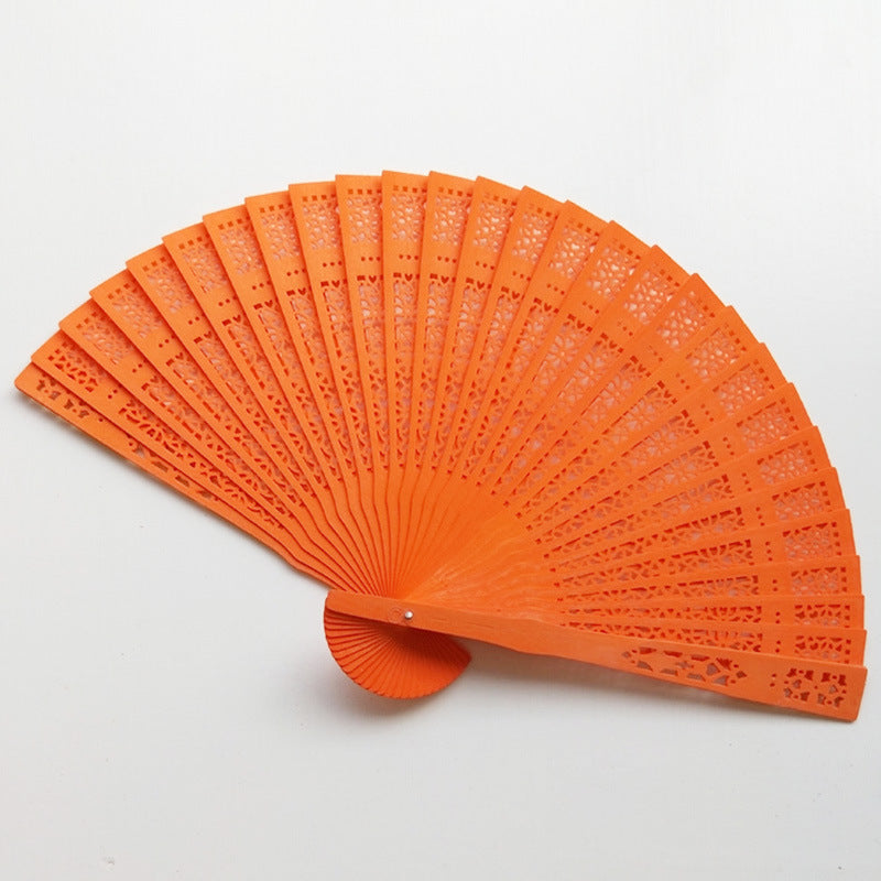 Ladies Elegant Plastic Fan with Artistic Cutouts Lightweight Handheld Accessory