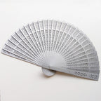 Ladies Elegant Plastic Fan with Artistic Cutouts Lightweight Handheld Accessory