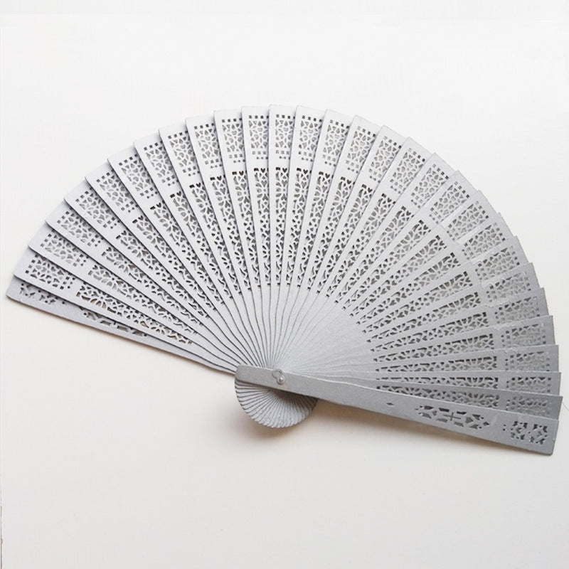 Ladies Elegant Plastic Fan with Artistic Cutouts Lightweight Handheld Accessory
