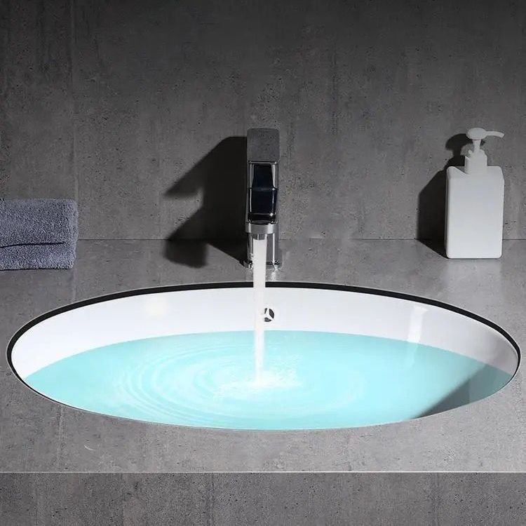 Modern Oval Undermount Porcelain Sink with Pop-Up Drain White Ceramic Bathroom Basin