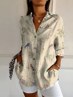 Harrow Avril floral linen blouse for women, featuring breezy summer fabric and vibrant floral pattern on lightweight apparel.