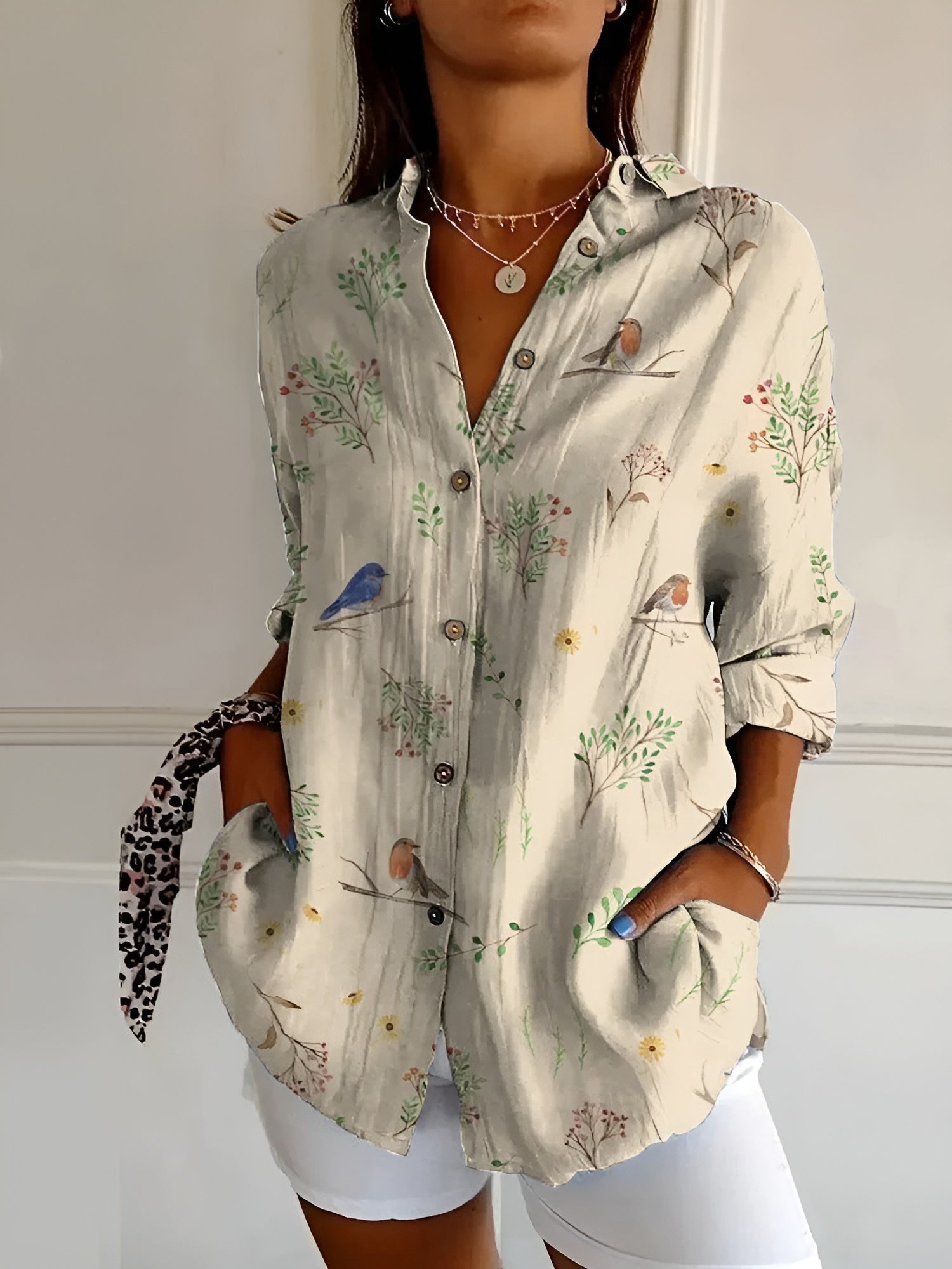 Harrow Avril floral linen blouse for women, featuring breezy summer fabric and vibrant floral pattern on lightweight apparel.