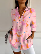 Harrow Avril floral linen blouse for women, lightweight and breezy summer apparel with a vibrant floral pattern.