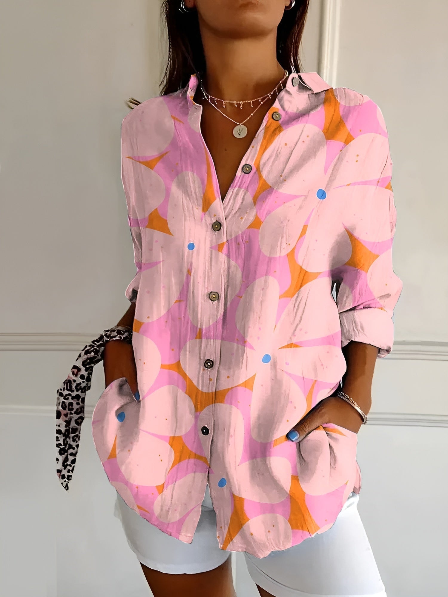 Harrow Avril floral linen blouse for women, lightweight and breezy summer apparel with a vibrant floral pattern.
