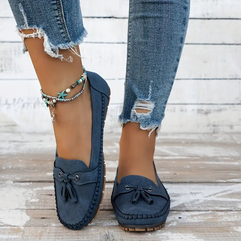 Harrow Becky women's slip-on flat loafers with soft, comfortable design and sleek black leather appearance.