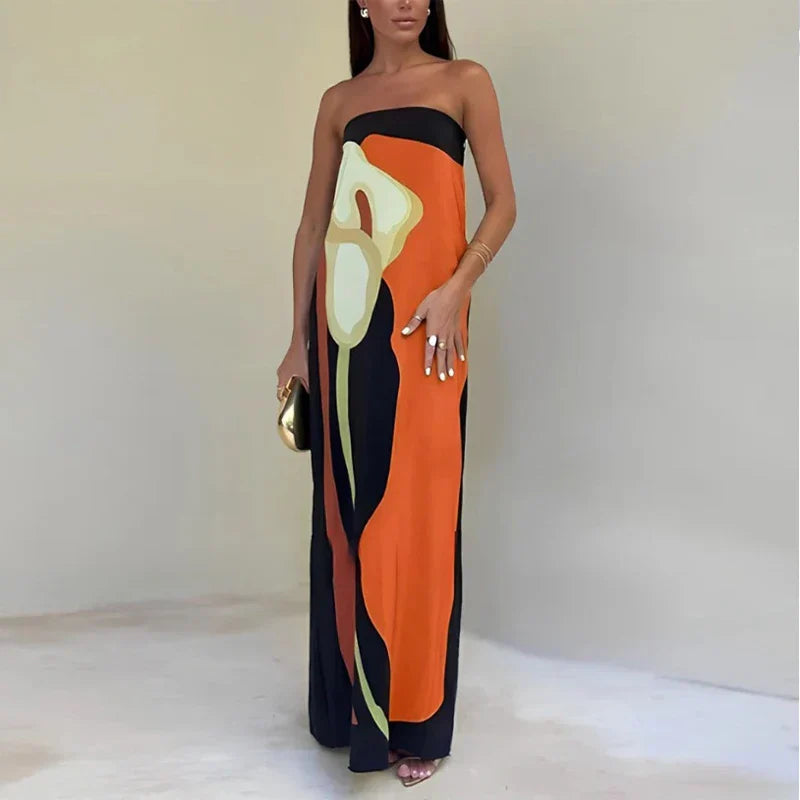Harrow Akosua elegant strapless printed cocktail maxi dress for women, perfect for summer parties with floral design and flowing fabric.