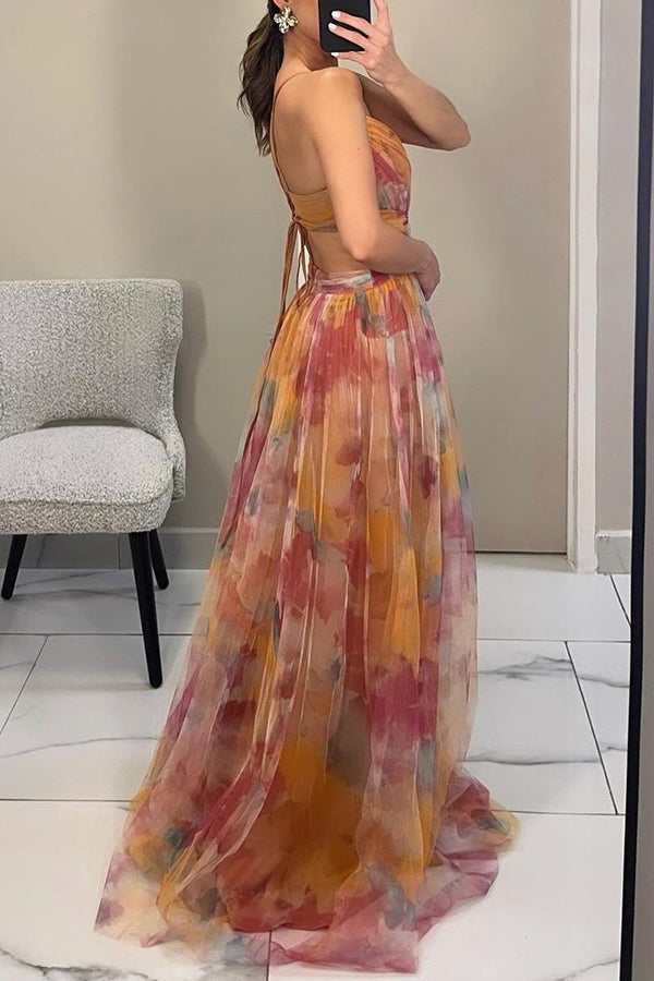 Harrow Cindy floral maxi dress for women featuring a vibrant summer floral print, flowing fabric, and elegant design.