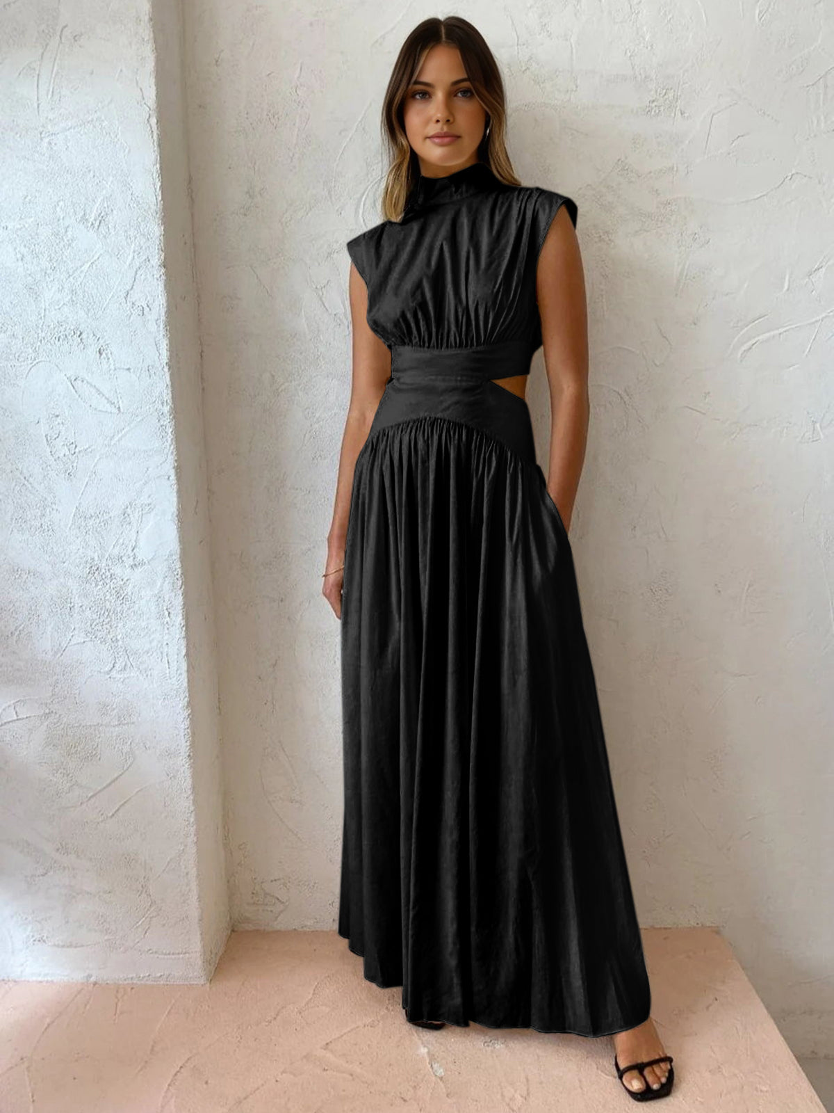 Elegant sleeveless maxi evening gown by Harrow, featuring a sophisticated formal design for women.