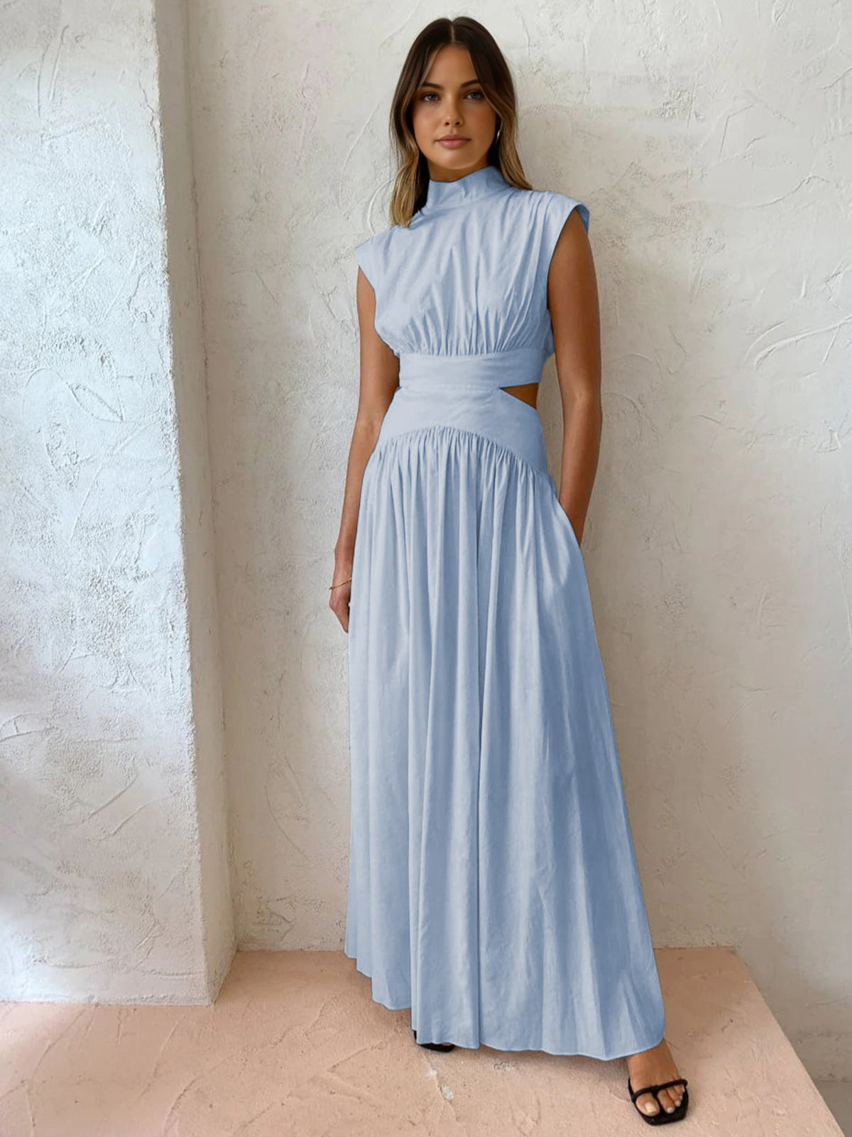 Elegant sleeveless maxi formal evening gown for women by Harrow, featuring flowing fabric and sophisticated design.
