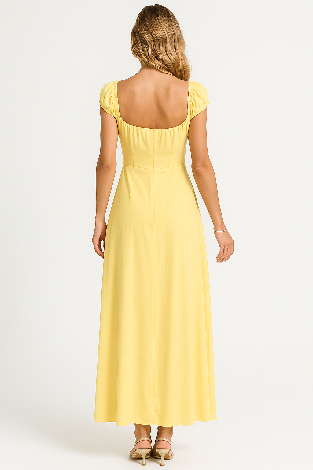 Yellow Aigerim elegant maxi evening gown for women by Harrow, featuring a flowing empire waist and formal dress design.