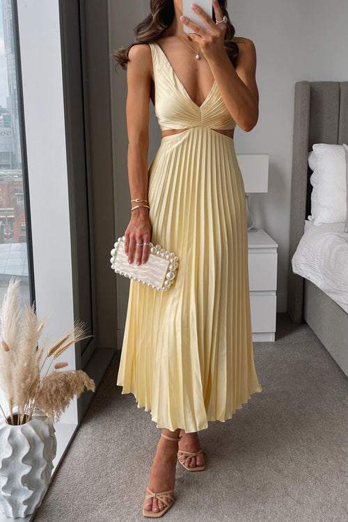 Evangeline elegant halter neck maxi dress for women, perfect for wedding guests, featuring flowing fabric and sophisticated style.