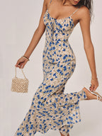 Harrow Akua floral maxi summer dress for women with spaghetti straps, ruched front and a vibrant floral pattern.