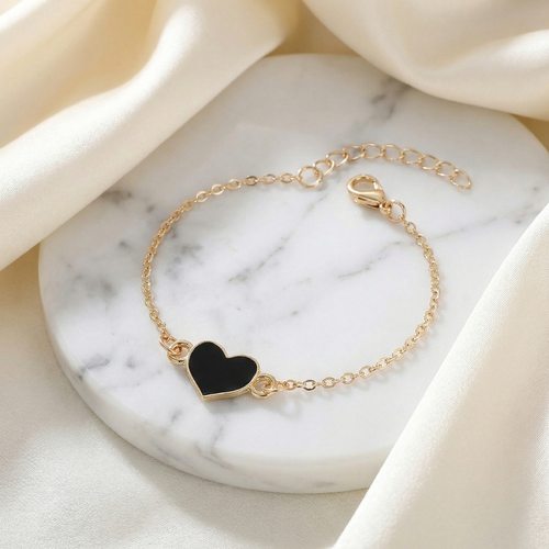 Harrow Adelaide gold heart charm bracelet for women, featuring a delicate gold chain with a heart-shaped pendant.