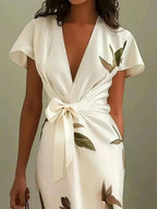Harrow Julianne wrap dress for women, stylish summer dress with a flattering fit, shown in a vibrant, flowy fabric.