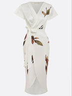 Harrow Julianne women's summer wrap dress featuring a flattering silhouette and vibrant floral pattern.