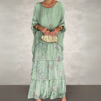 Elegant long flowing summer dress for women by Harrow, featuring a casual and comfortable style perfect for warm weather.