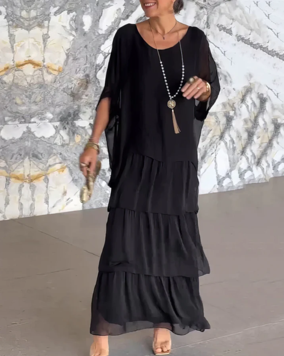 Elegant long flowing summer dress for women by Harrow, featuring a casual and stylish design perfect for warm weather.