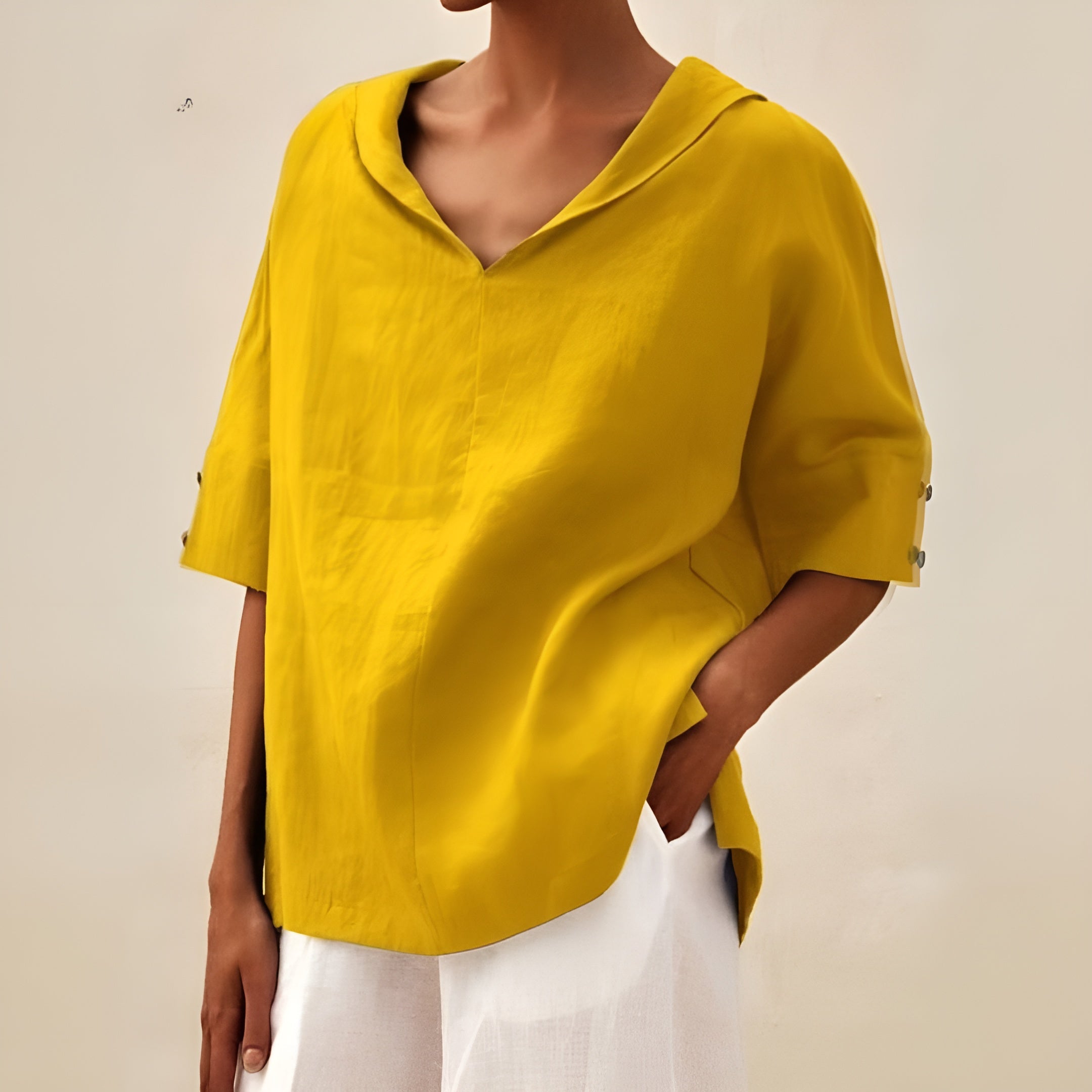 Harrow Kathleen casual summer blouse for women, featuring lightweight fabric and relaxed fit, pictured in a natural outdoor setting.