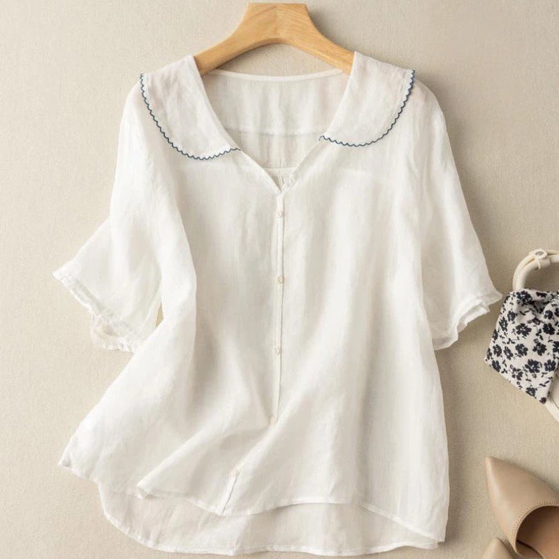 Harrow Kristi floral linen blouse for women, featuring a relaxed fit and vintage-inspired summer floral design.
