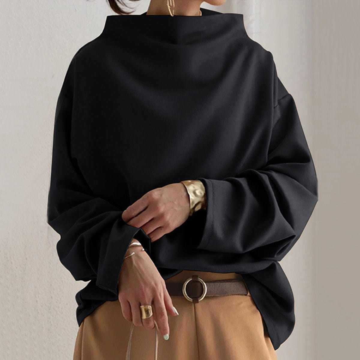 Harrow Margot high-neck soft knit top for women, shown in a close-up of the cozy, fitted garment with a smooth texture.