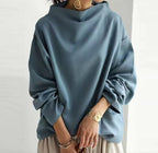 Harrow Margot high-neck soft knit top for women, featuring a cozy design and fitted silhouette in a neutral color.