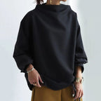 Harrow Margot high-neck soft knit top for women, featuring a cozy, fitted design in a neutral color.