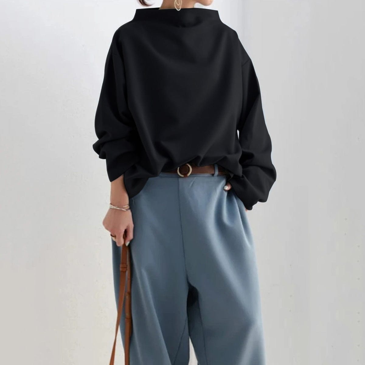 Harrow Margot high-neck soft knit top for women, shown in a close-up of the cozy, fitted neckline and smooth fabric texture.