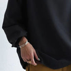 Harrow Margot high-neck soft knit top for women, featuring a cozy, fitted design in a neutral color.