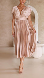 Elegant flowing maxi dress for women by Harrow, featuring pleated design and stylish silhouette, shown in a full-length view.