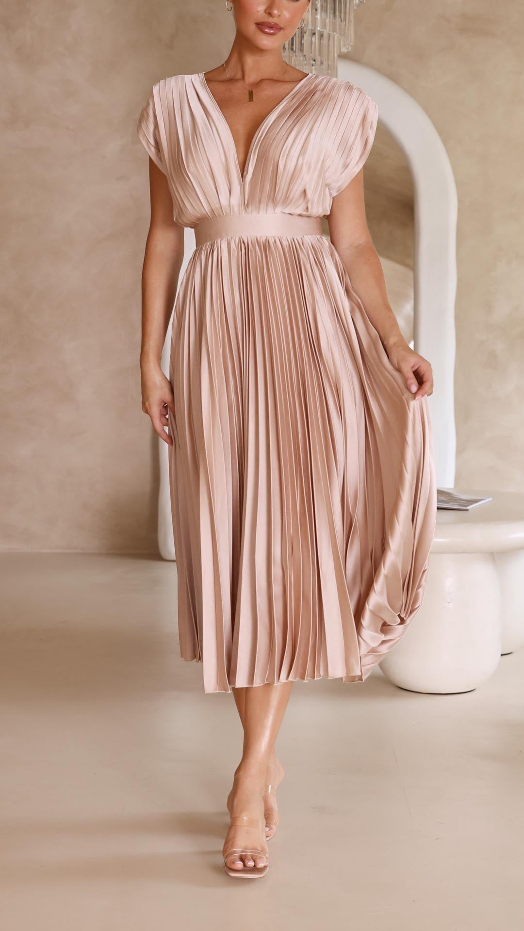 Elegant flowing maxi dress for women by Harrow, featuring pleated design and stylish silhouette, shown in a full-length view.