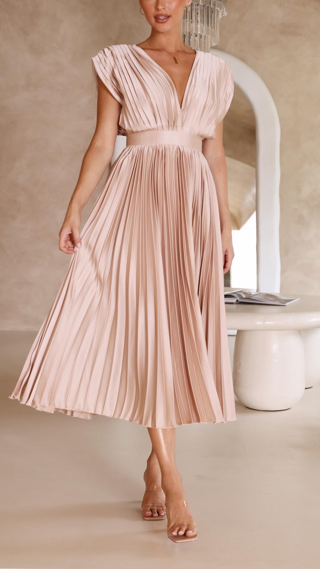 Elegant flowing maxi dress for women by Harrow, featuring pleated design and lightweight fabric in a sophisticated style.