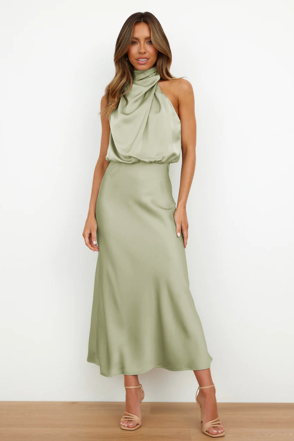 Harrow Mariana casual summer dress for women, featuring a halter neckline and lightweight fabric, perfect for warm weather events.