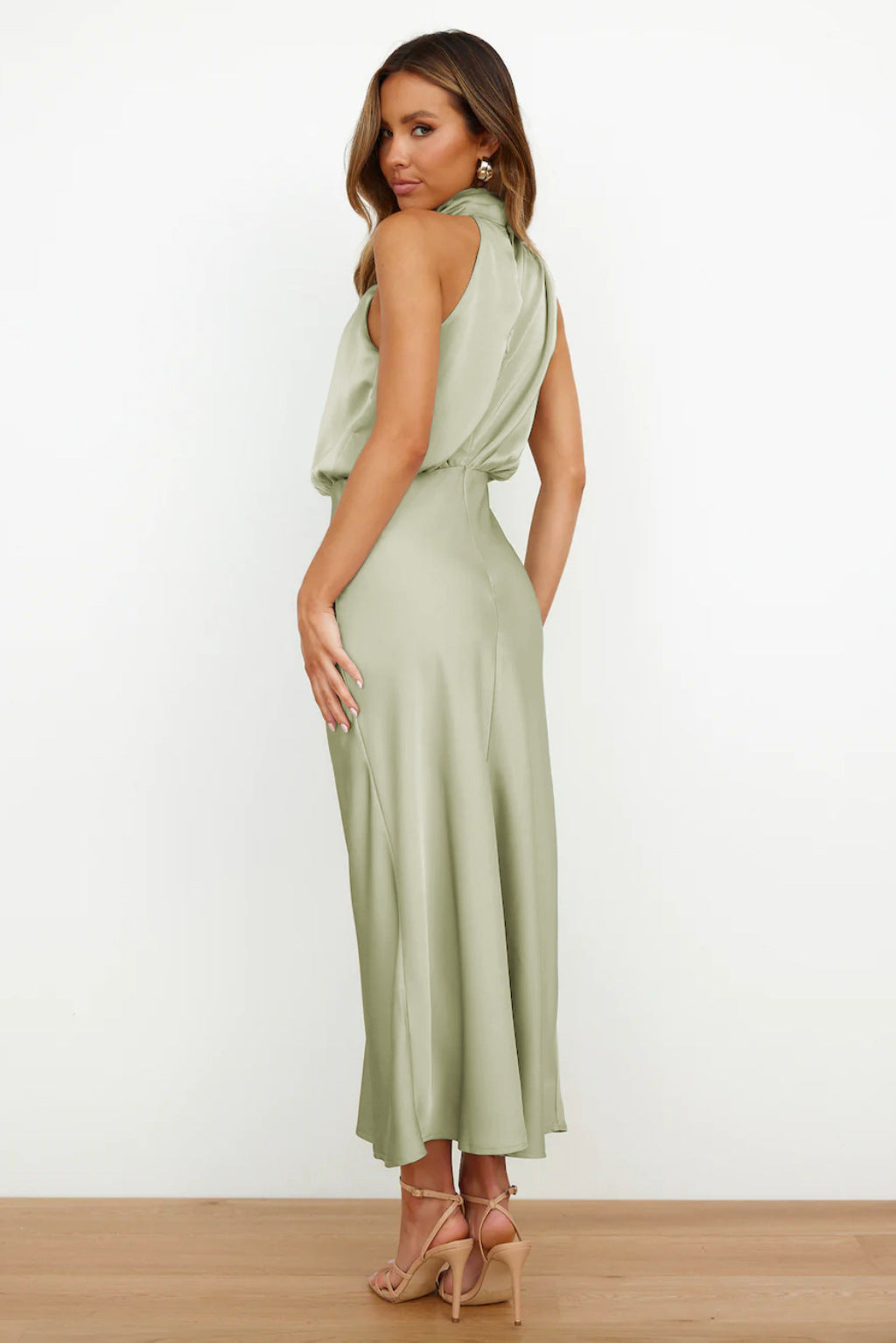 Harrow Mariana casual summer dress for women, featuring a stylish halter neckline and lightweight fabric for warm weather.