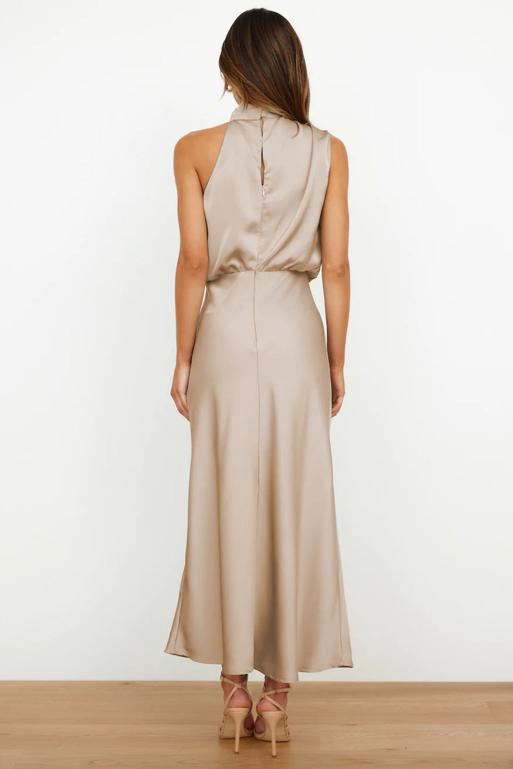 Harrow Mariana casual summer dress for women, featuring an elegant halter neckline and lightweight fabric for warm weather.