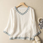 Printed casual women's blouse with V-neck design by Harrow, featuring a colorful summer pattern.