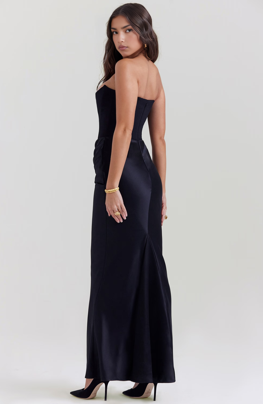 Mia strapless corset maxi dress in elegant black fabric, featuring a fitted bodice and flowing skirt for women by Harrow.