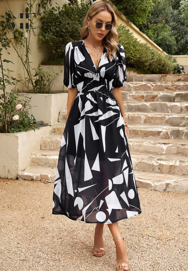 Harrow Monica floral dress for women featuring a vibrant summer print and flowing fabric, perfect for warm weather occasions.