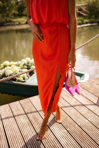 Harrow Nicole summer midi dress for women, elegant sleeveless design with floral pattern and flowing fabric suitable for warm weather.