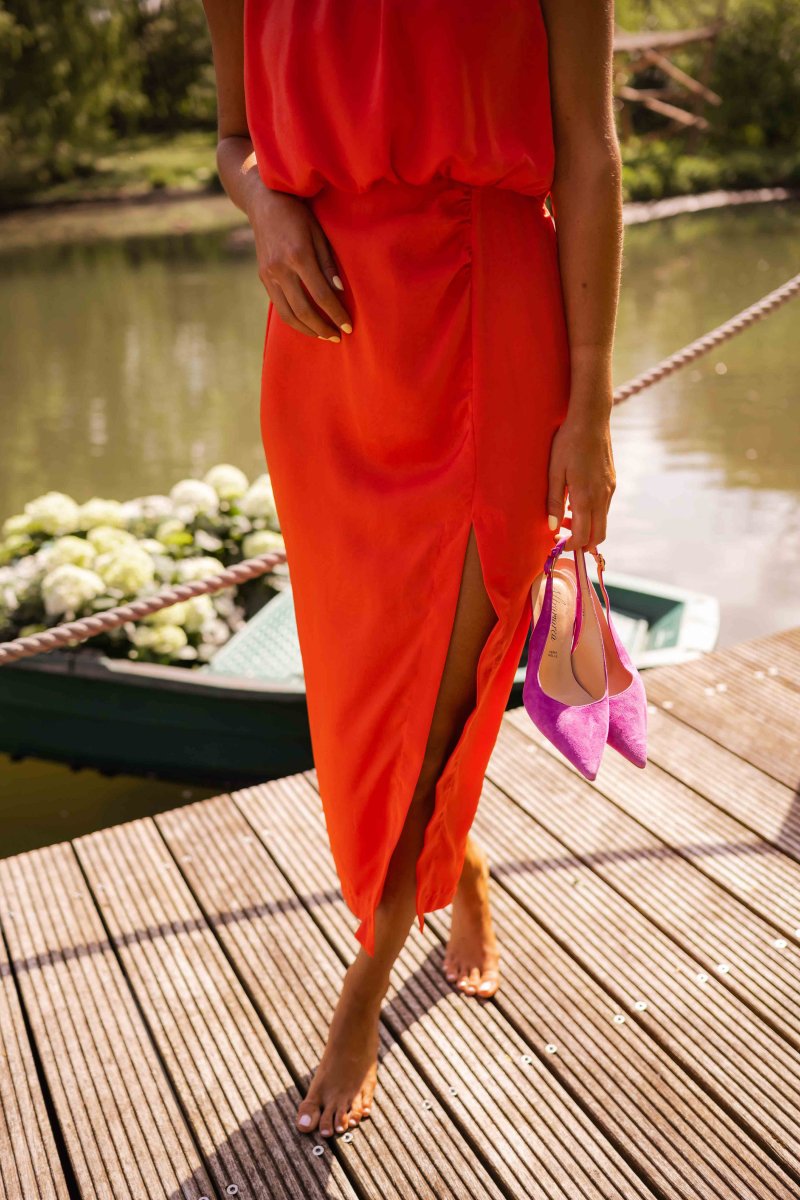 Harrow Nicole summer midi dress for women, elegant sleeveless design with floral pattern and flowing fabric suitable for warm weather.