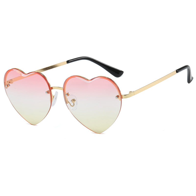 Women’s Heart-Shaped Sunglasses with Mirrored Lenses and Metal Frame UV Protection