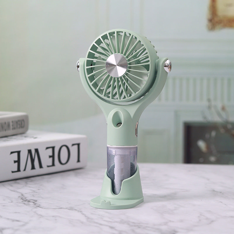 Portable Handheld Fan with Integrated Misting Function Adjustable Speed Settings