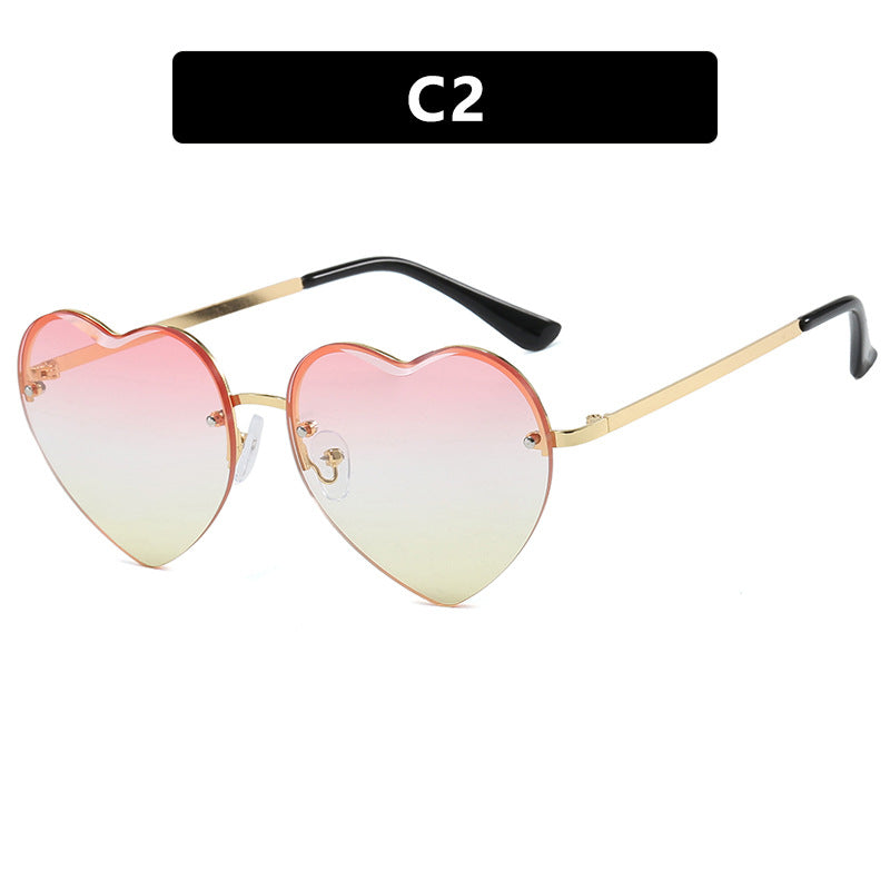 Women’s Heart-Shaped Sunglasses with Mirrored Lenses and Metal Frame UV Protection