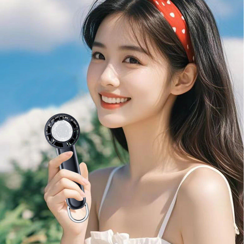 Ergonomic Handheld Cooling Fan Portable Rechargeable Personal Fan with Multiple Speeds