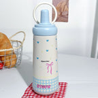 Women’s BPA-Free Plastic Water Bottle with Elegant Bow Motif and Carry Handle Stylish Design