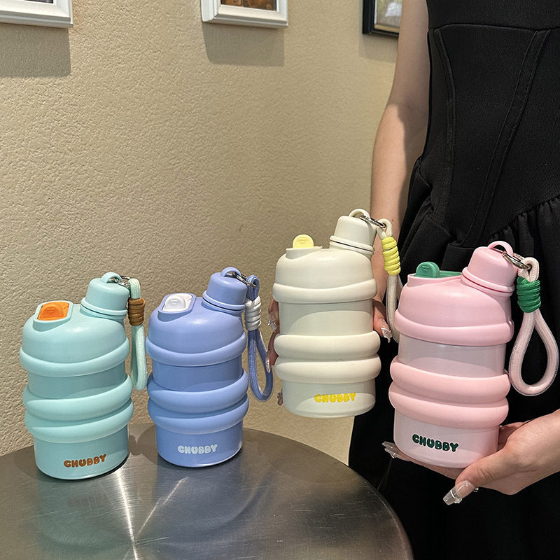 Women’s BPA-Free Plastic Water Bottle with Non-Slip Grip and Carry Loop Multifunctional Hydration Bottle