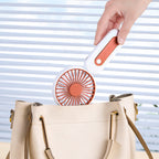 Women's Portable Mini Fan with Ergonomic Handle Rechargeable Battery Compact