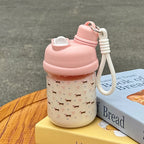 Women’s BPA-Free Plastic Water Bottle with Straw and Carry Loop Creative Design