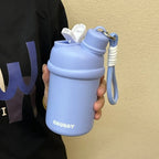 Women’s Sporty BPA-Free Water Bottle with Leak-Proof Cap and Carry Strap