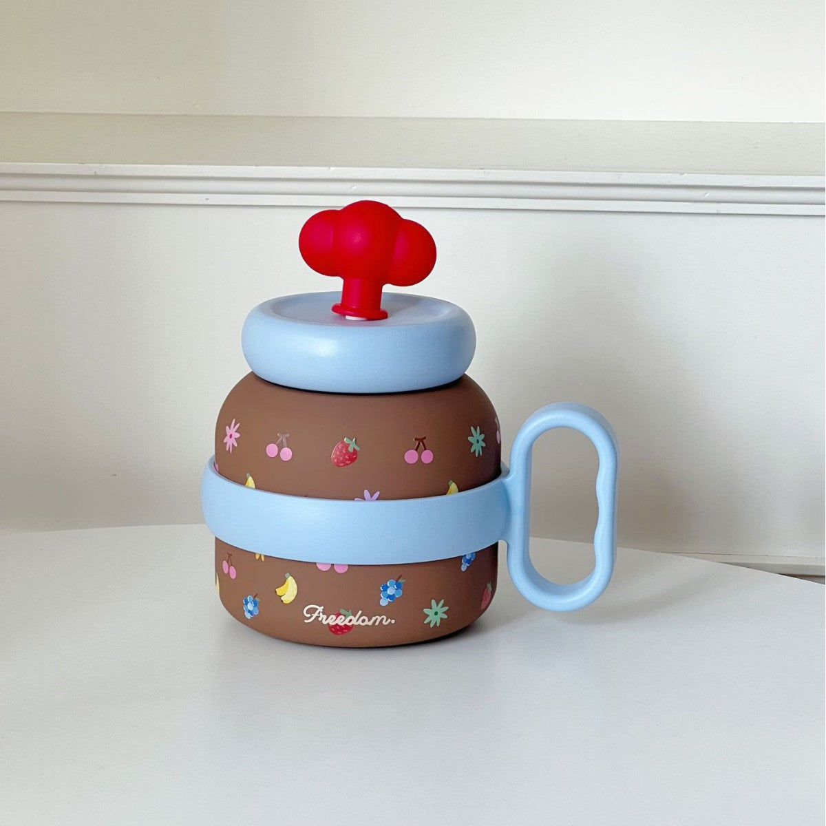 Creative Women's Drinking Bottle with Playful Colorful Design Ergonomic Handle and Secure Lid