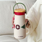 Women’s Ergonomic BPA-Free Plastic Water Bottle with Carrying Handle and Floral Design